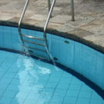 4 steps to clean up your pool after a rainstorm