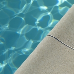 The Cost Savings of Maintaining Your Pool Coping