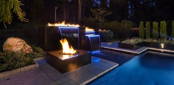 photo displaying a pool fire/waterfall combination